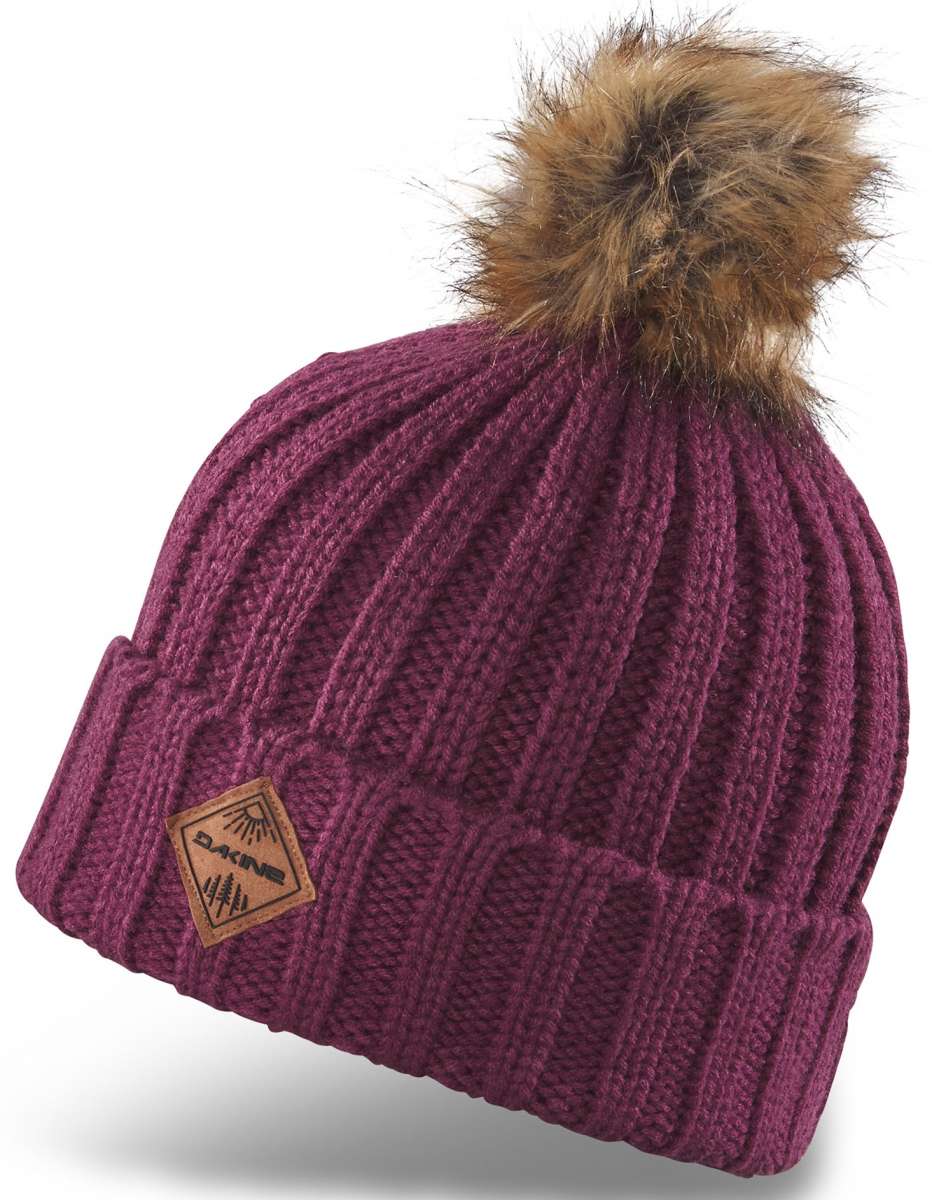 Dakine Ladies Kylie Beanie - A maroon beanie with a brown faux fur pom-pom on top.