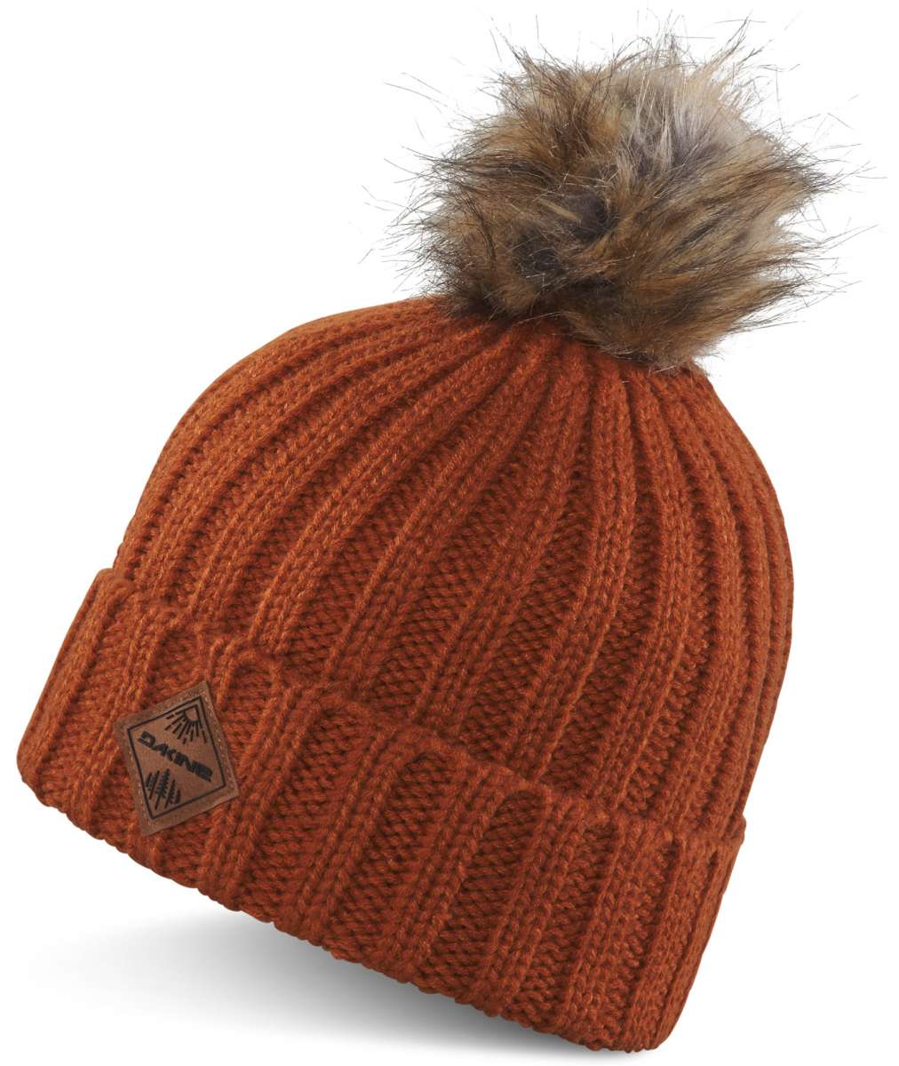 Dakine Ladies Kylie Beanie 2024 - A rust-colored beanie with a brown faux fur pom-pom on top.