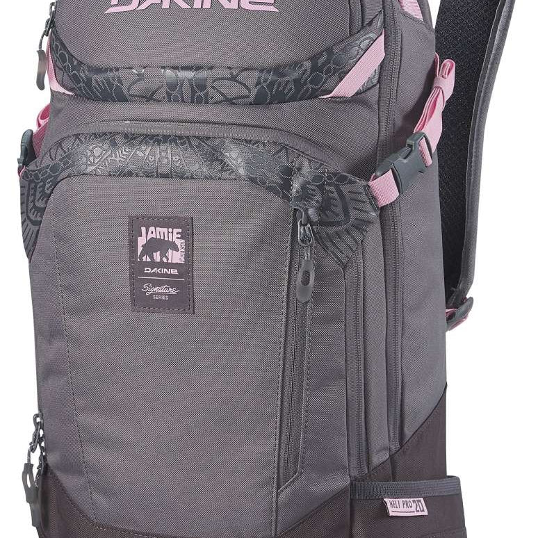 Dakine Ladies Team Heli Pro 20L 2022-2023 - A gray backpack with a pink logo and accents, featuring a zippered front pocket and two side pockets.