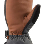 Dakine Leather Scout Mitt 2022-2023 - A brown leather mitt with a black trim and elastic wrist strap.