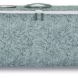 Dakine Low Roller Board Bag 2024 - A light blue bag with a white zipper and handle, featuring a floral pattern on its side.