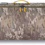 Dakine Low Roller Board Bag 2024 - A brown bag with a zippered top and handle on one end, featuring a camouflage pattern of shades of green, tan, and gray.