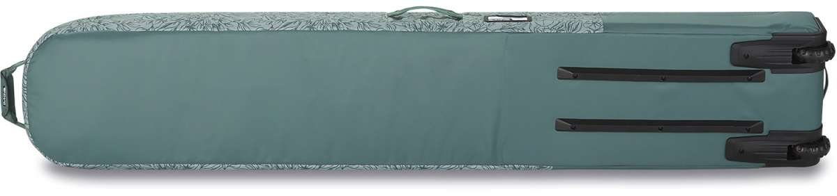 Dakine Low Roller Board Bag 2024 - A large, rectangular bag with a dark gray color and white stitching, featuring a handle on top and wheels at the bottom.