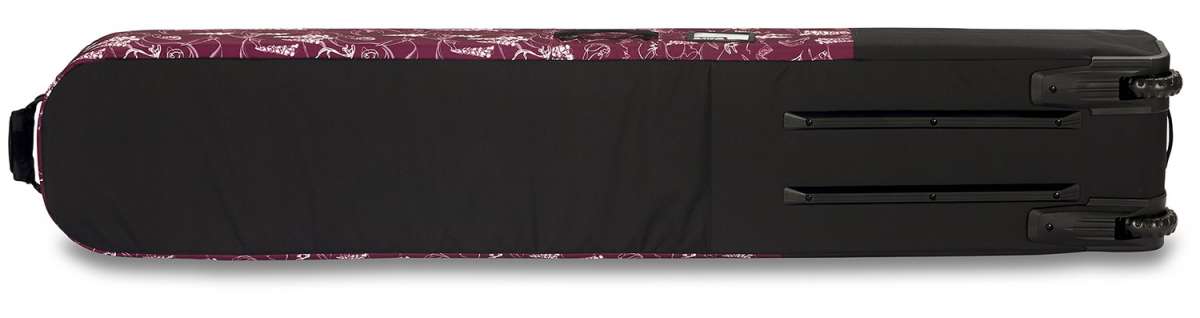 Dakine Low Roller Board Bag 2024 - Black bag with white floral pattern along top edge and black handle on end.