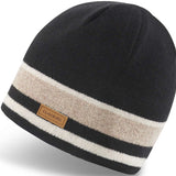 Dakine Lumberman Merino Beanie 2024 - A black beanie with a tan stripe around the middle and a brown leather label that says "DAKINE" in all caps.