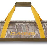 Dakine Padded Ski Sleeve 2024 - A padded sleeve with a zippered top and yellow zipper pull, featuring a brown camouflage pattern on its exterior.