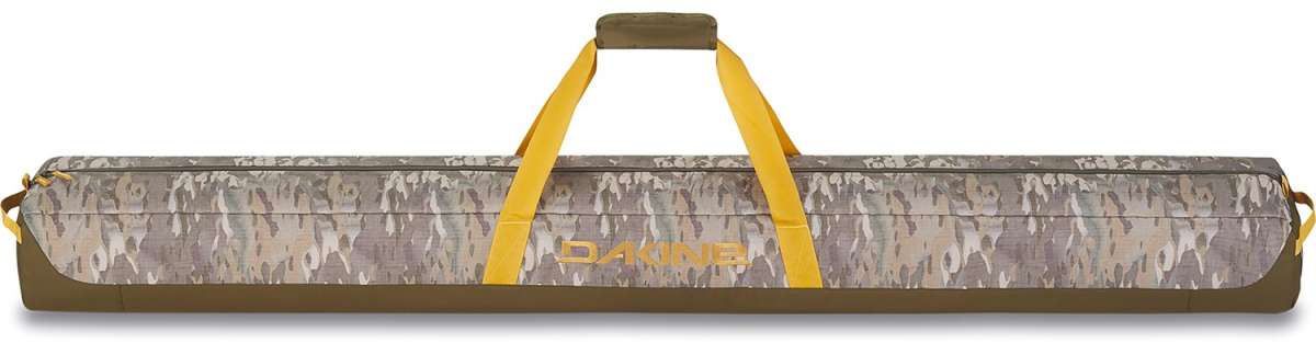 Dakine Padded Ski Sleeve 2024 - A padded sleeve with a zippered top and yellow zipper pull, featuring a brown camouflage pattern on its exterior.