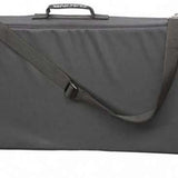 Dakine Pipe Board Bag 2024 - A dark gray bag with a zippered top and shoulder strap, featuring a handle on one end.
