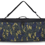 Dakine Pipe Board Bag 2024 - A black bag with a white logo and straps on top.