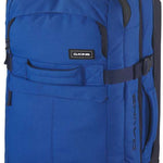 Dakine Split Roller 85L 2022-2023 - A large blue roller bag with black wheels and handle, featuring a zippered front pocket and two side pockets.