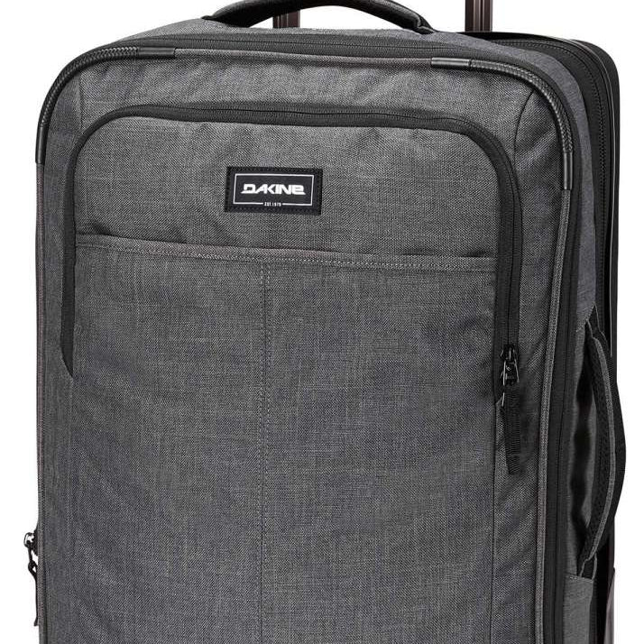 Dakine Status Roller 42L 2022-2023 - A gray roller suitcase with a handle and wheels, featuring a zippered pocket on its front.