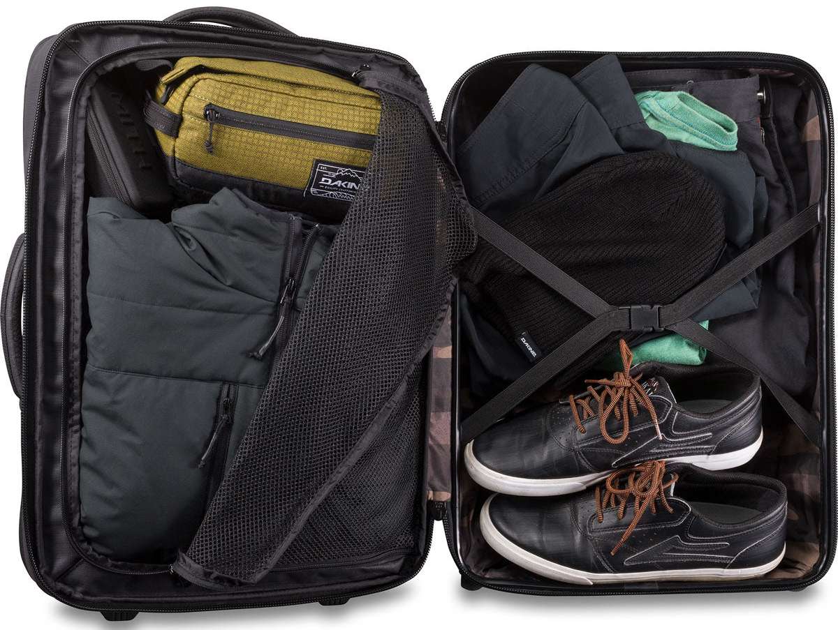 Dakine Status Roller 42L 2022-2023 - Black roller bag with black wheels and handle, featuring a zippered pocket on top and two side pockets.