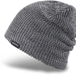Dakine Tall Boy Beanie 2022-2023 - A black beanie with a white and grey marled pattern, featuring a folded cuff at the bottom.