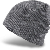 Dakine Tall Boy Beanie 2022-2023 - A black beanie with a white and grey marled pattern, featuring a folded cuff at the bottom.