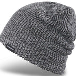 Dakine Tall Boy Beanie 2024 - A black beanie with a subtle white marled pattern and a small black tag on the cuff that reads "DAKINE" in white letters.