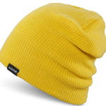 Dakine Tall Boy Beanie 2024 - A bright yellow beanie with a folded cuff and black Dakine label on the side.