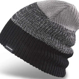 Dakine Tall Boy Beanie 2024 - A black beanie with a gray stripe on top.