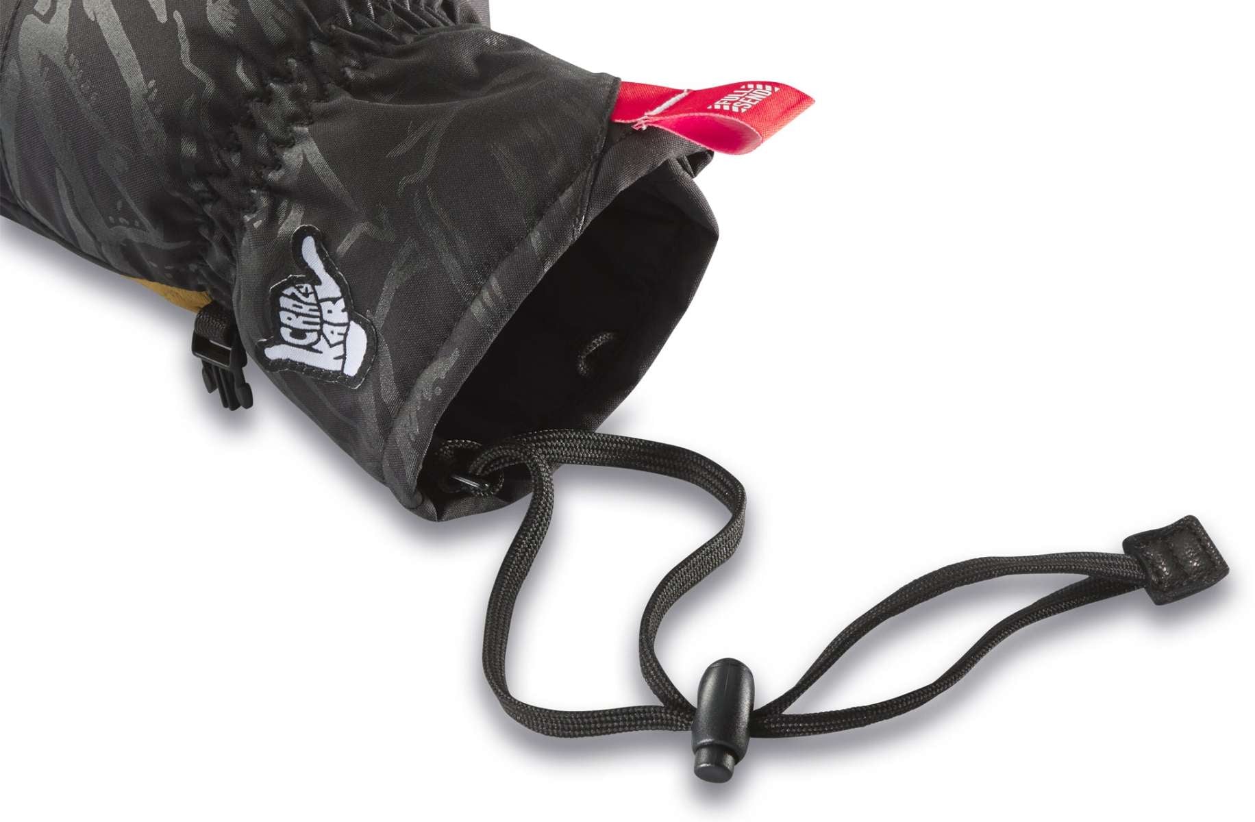 Dakine TM Fillmore K Fostvedt Glove 2024 - A black glove with a subtle gray pattern and yellow accents on the wrist strap.