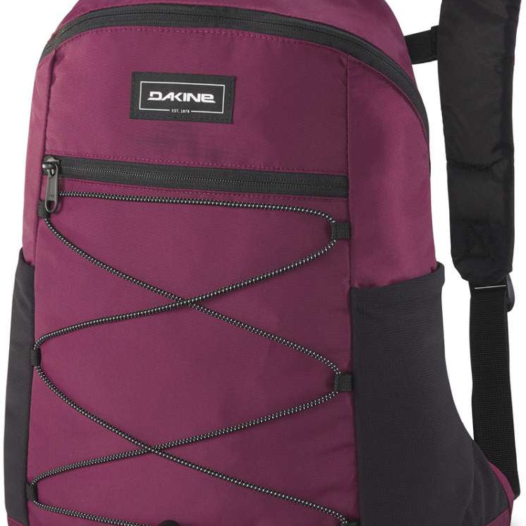 Dakine Wndr Pack 18L 2022-2023 - A maroon backpack with a zippered front pocket and black straps.