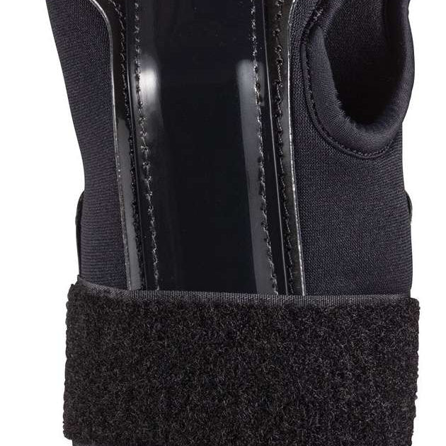 Dakine Wristguard - Black wrist guard with white stitching on a black background.