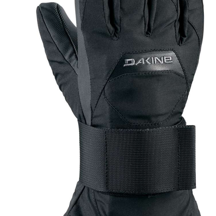 Dakine Junior's Wristguard Glove - A black glove with a wrist strap and thumb guard, featuring a textured palm for grip.