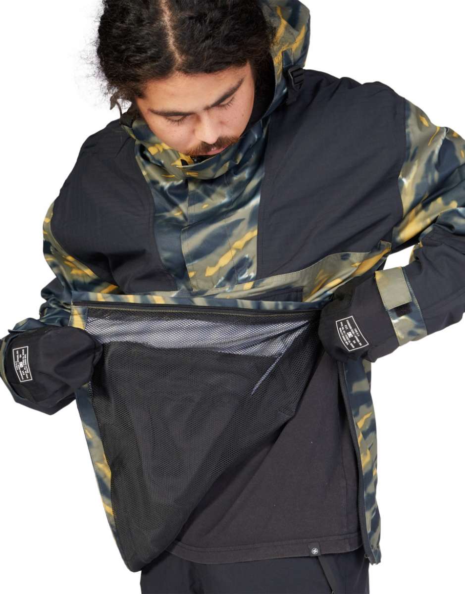 DC 43 Anorak Jacket 2023 - A black jacket with a yellow and grey camouflage pattern on the hood, sleeves, and chest.