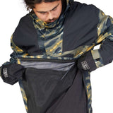 DC 43 Anorak Jacket 2023 - A black jacket with a yellow and grey camouflage pattern on the hood, sleeves, and chest.