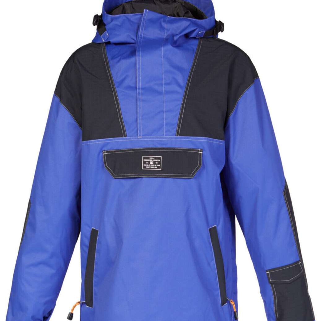 DC 43 Anorak Jacket 2023 - A blue jacket with a black chest pocket and white stitching.