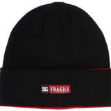 DC Andy Warhol Beanie 2024 - Black beanie with a repeating pattern of small, multicolored squares and the word "Warhol" in white letters on the front.
