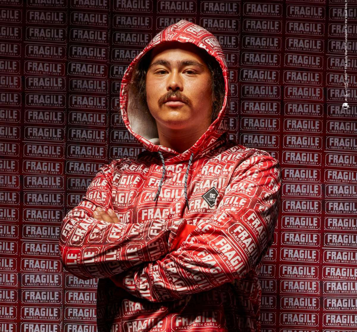 DC AW Snowstar Fleece Hoodie 2024 - Red fleece hoodie with white snowboarder and mountain graphic.