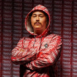 DC AW Snowstar Fleece Hoodie 2024 - Red fleece hoodie with white snowboarder and mountain graphic.