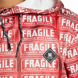 DC AW Snowstar Fleece Hoodie 2024 - A red fleece hoodie with white snowboarder and mountain graphics, featuring a hood and drawstrings.