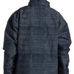DC AW Vista Shell Jacket 2024 - A black jacket with a repeating pattern of white rectangles featuring the word "fragile" in various fonts and orientations.