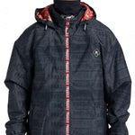 DC AW Vista Shell Jacket 2024 - A black jacket with a repeating pattern of "DC" and "AW" logos in white, featuring a red zipper pull.