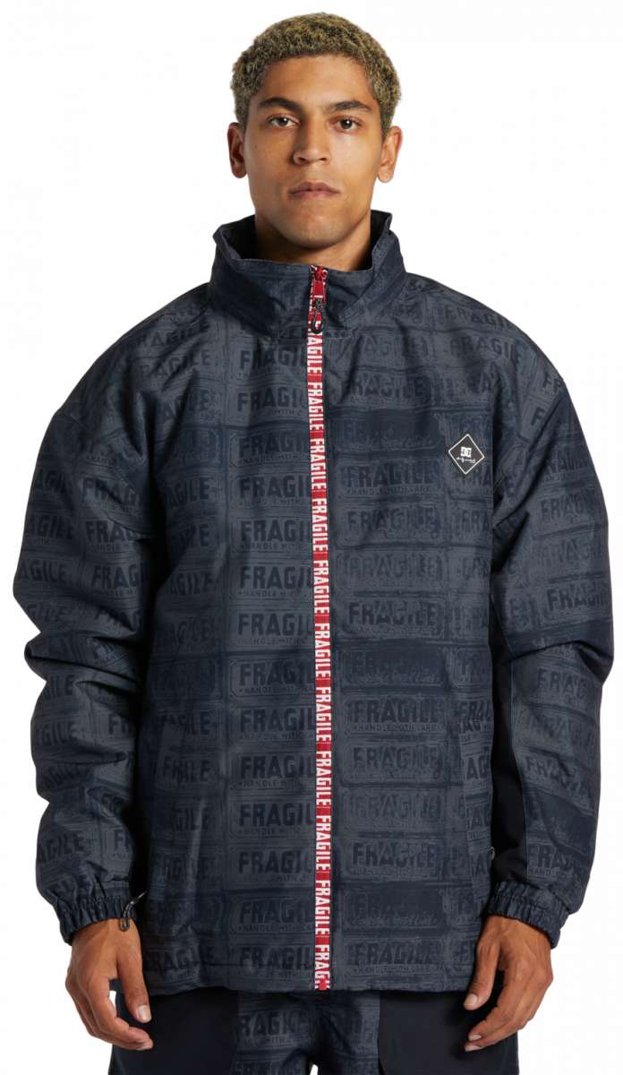 DC AW Vista Shell Jacket - A black jacket with a repeating pattern of "DC" and "AW" logos in white, featuring a zipper down the front.