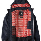 DC AW Vista Shell Jacket 2024 - A black jacket with a subtle pattern of small white snowflakes and a repeating "DC" logo in gray.