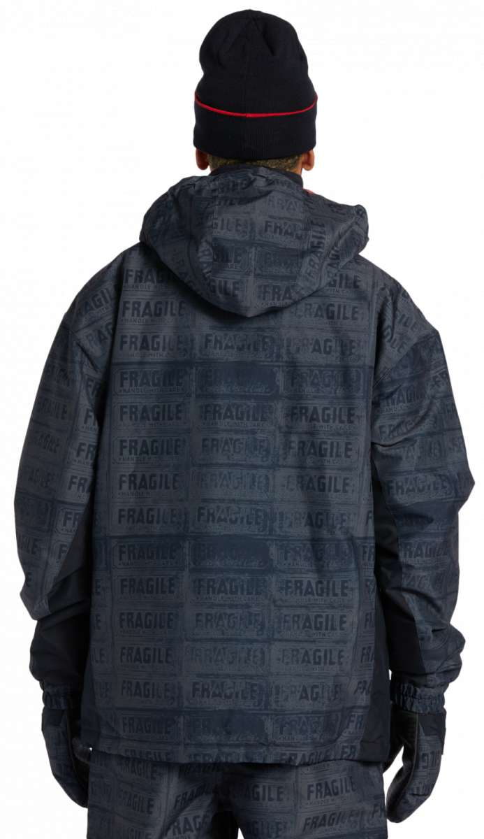 DC AW Vista Shell Jacket 2024 - A black jacket with a subtle pattern of small white snowflakes and geometric shapes, featuring a hood and zip closure.