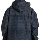 DC AW Vista Shell Jacket 2024 - A black jacket with a subtle pattern of small white snowflakes and geometric shapes, featuring a hood and zip closure.