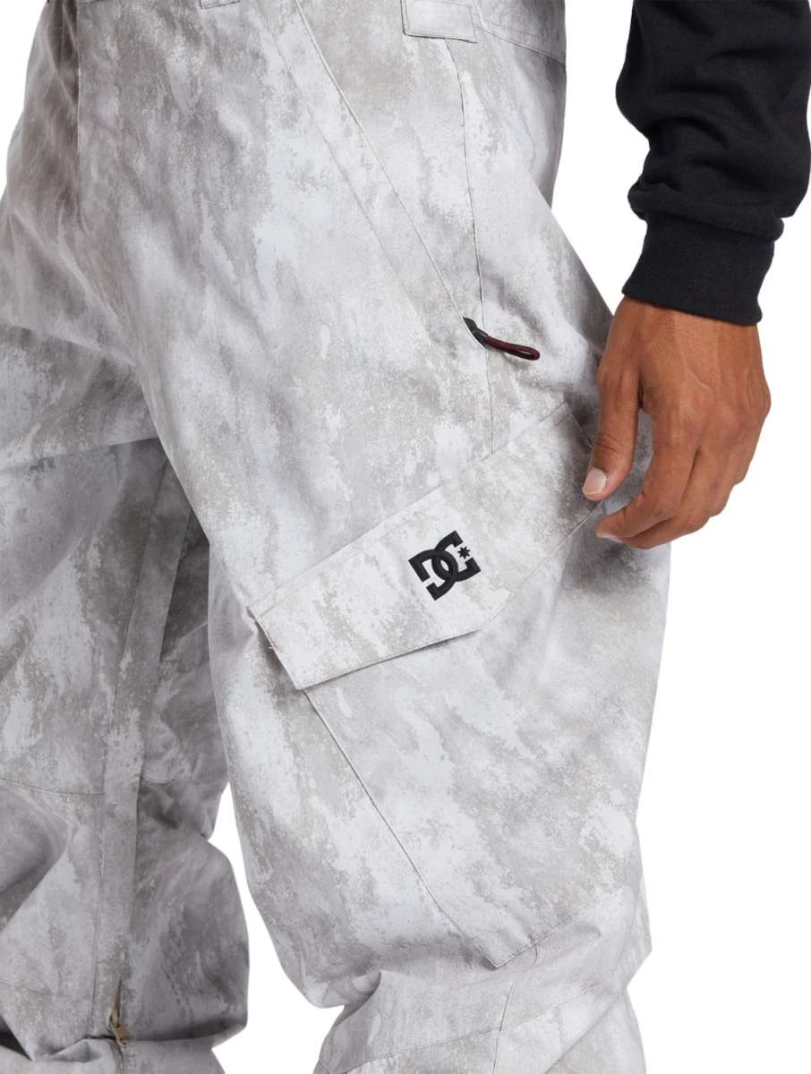 DC Banshee Insulated Pant 2024 - A pair of snowboard pants with a subtle gray and white marbled pattern on a light gray background.