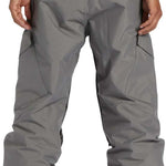 DC Banshee Insulated Pant 2024 - Black insulated snowboard pants with a zippered pocket on the side and a black logo patch on the left leg.