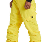 DC Banshee Insulated Pant 2024 - Yellow snow pants with a black logo on the left leg.