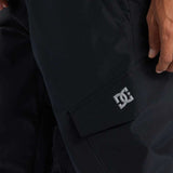 DC Banshee Insulated Pant 2024 - Black insulated snow pants with a white DC logo on the left leg cuff.