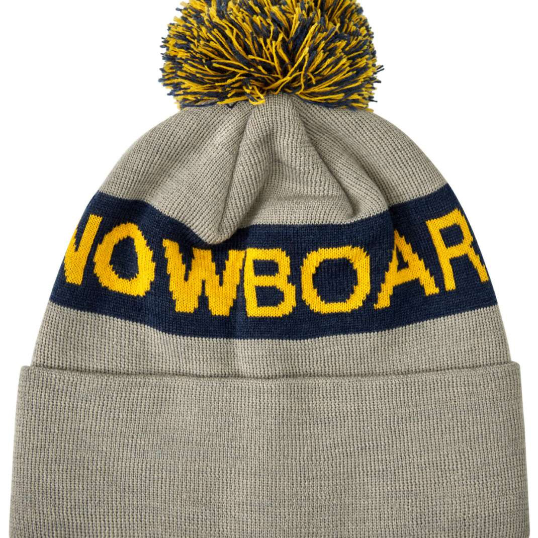 DC Chester Beanie 2023 - A gray beanie with a yellow and blue pom-pom on top.