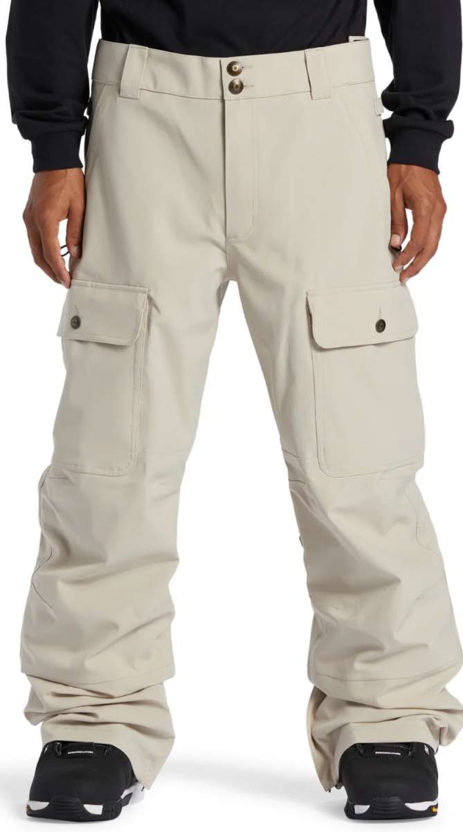 DC Code Shell Pant 2024 - Beige snow pants with zippered pockets, adjustable cuffs and belt loops.