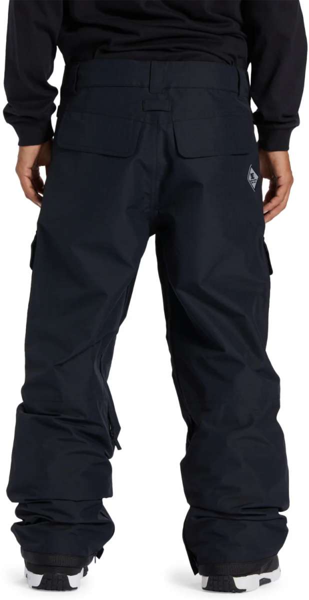 DC Code Shell Pant 2024 - Black snow pants with a zippered pocket on the side and adjustable Velcro straps at the ankles.