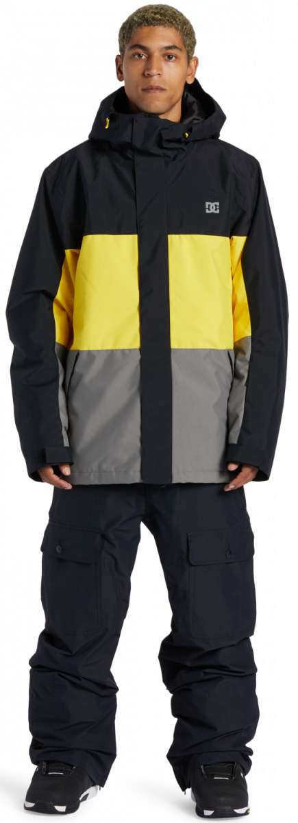 DC Defy Insulated Jacket 2024 - A black jacket with yellow and grey panels on chest and sleeves.