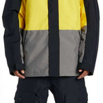 DC Defy Insulated Jacket 2024 - A black jacket with yellow and grey panels on chest and sleeves.