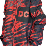 DC Juniors Propaganda Insulated Jacket 2023 - A black and red camouflage patterned jacket with a hood, featuring a zip-up front and two side pockets.