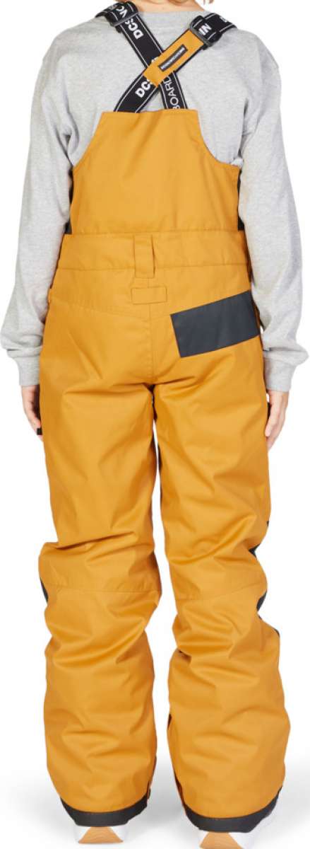 DC Juniors Roadblock Bib 2023 - Black bib with white logo on left leg and black straps with white "DC" logo.