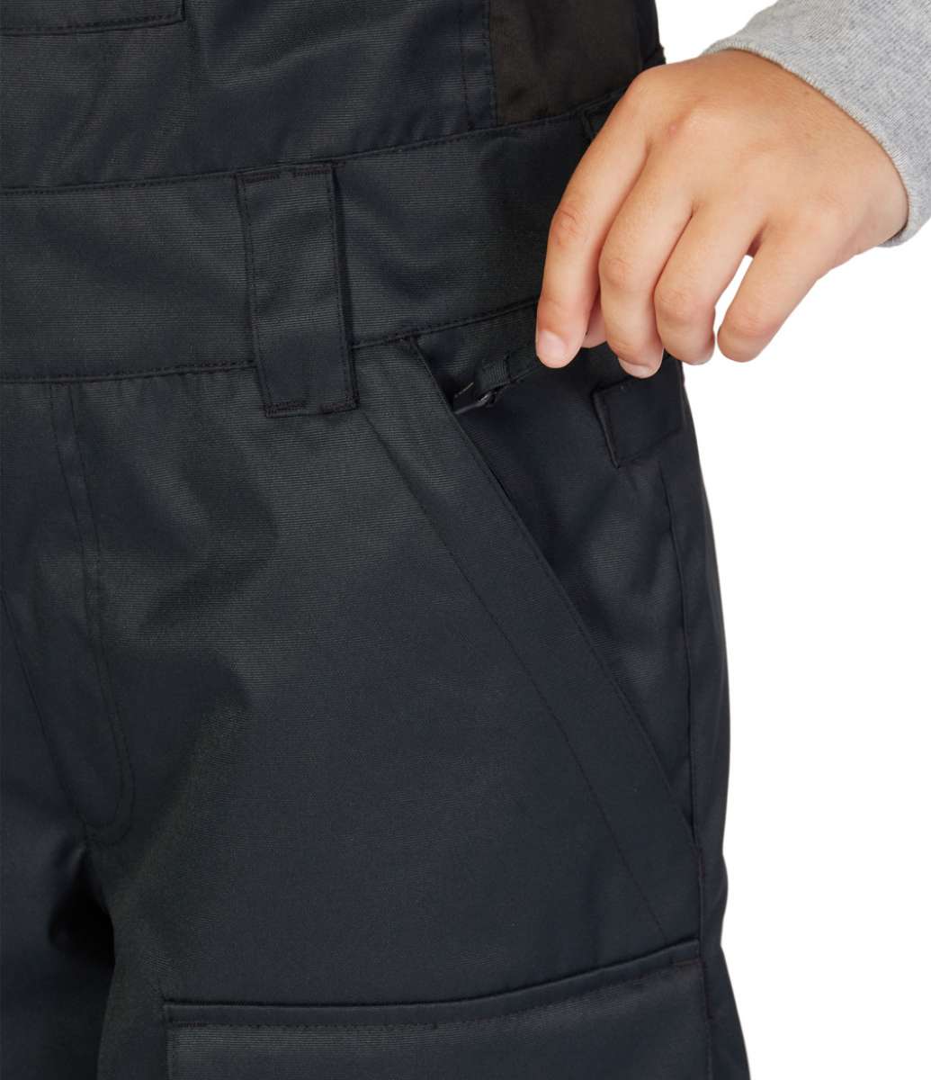 DC Juniors Roadblock Bib 2023 - Black bib with white DC logo on left leg and black zipper down center front.